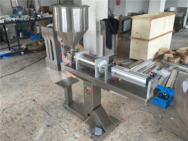 Half-outomatiese enkelkop heuningvulmasjien